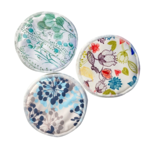 Close-up of the soft, absorbent layers of bamboo breast pads, featuring delicate sewing for durability and comfort.