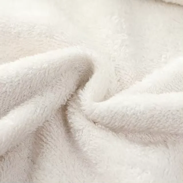 Organic sherpa blankie offering a mix of softness and warmth for everyday use