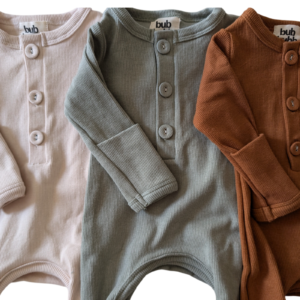 Organic cotton onesie and matching beanie set, perfect for keeping your baby cozy and stylish.