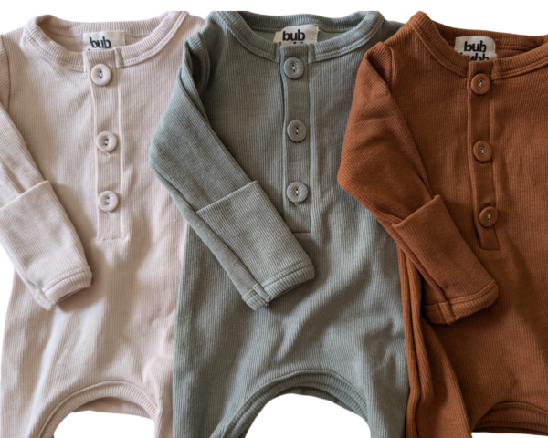Organic cotton onesie and matching beanie set, perfect for keeping your baby cozy and stylish.
