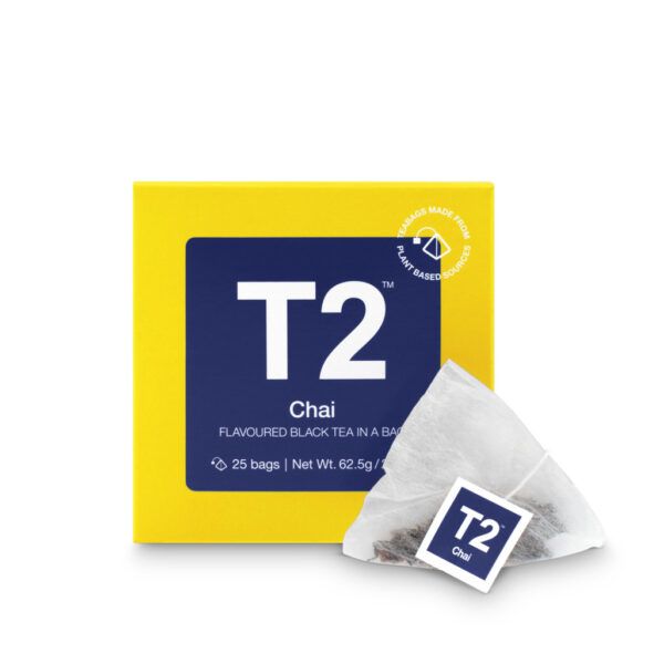 Expecting mom enjoying a calming cup of T2 tea while wearing the organic BOODY PJ’s from The Luxe Birth Bundle.