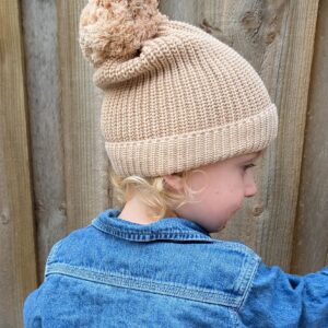 chunky knit beanie with pom-pom.