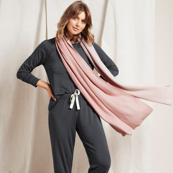 Luxurious satin pillowcases paired with soft organic BOODY PJ’s from The Luxe Birth Bundle, ideal for a cozy, restful sleep.