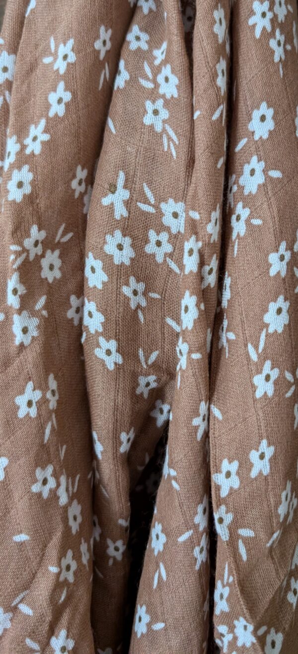 Cotton muslin swaddle available in five unique designs, measuring 120cm x 110cm